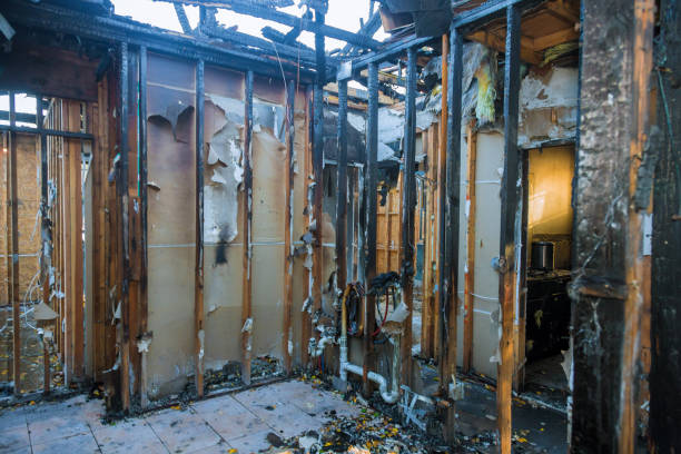 Professional Fire Damage Restoration technician working in Muscatine, IA